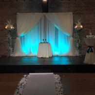 Can Up-lighting & White Voile Draping