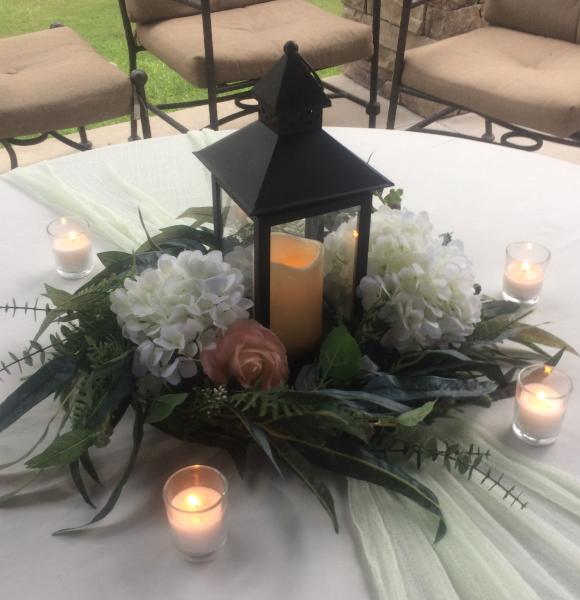 Item includes: 1-Lantern10" w/Flameless LED Candle.
10 Lanterns w/Candles Available @ $10/each.
Like New Condition.
(Florals and Votives not included.)


