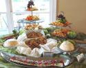 Assortment of dips, crackers & cheeses.