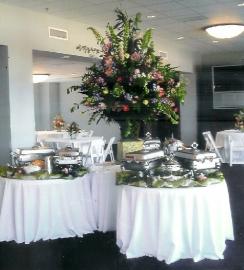Stainless steel chaffing dishes are one way to serve at a reception.