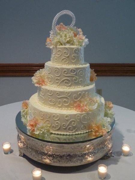 Brides cake with swirls and Hydrangea